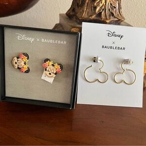 Minnie Mouse Floral Stud Earring and Mickey Mouse earrings.
